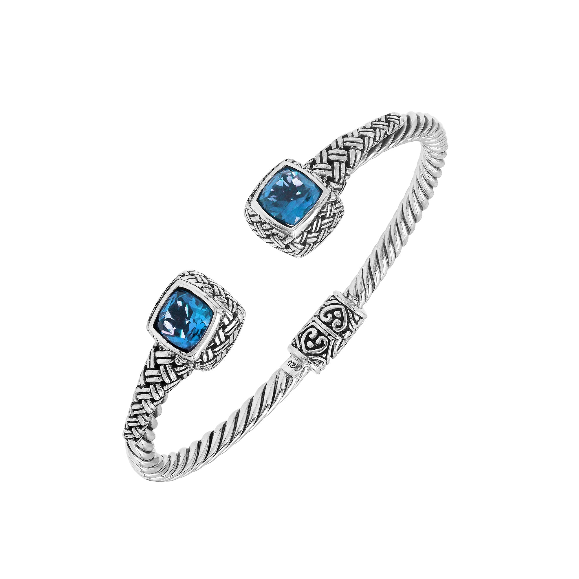 Sterling silver braided bangle with blue topaz quartz ends and Balinese oxidized design