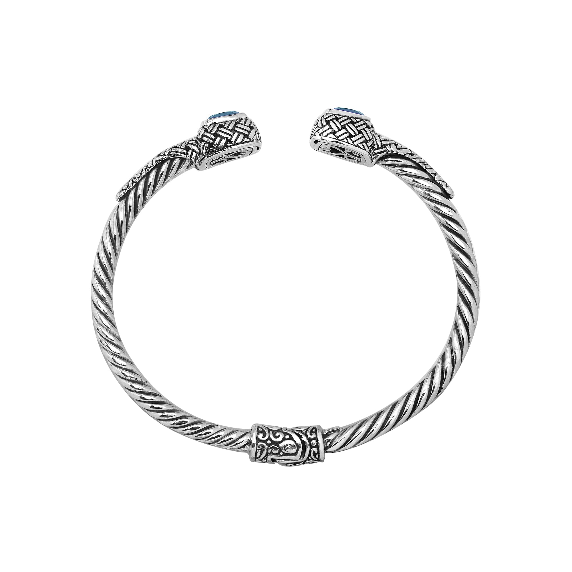 Sterling silver braided bangle with blue topaz quartz ends and Balinese oxidized design