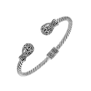 Sterling silver twisted bangle with ornate Balinese end design and oxidized finish