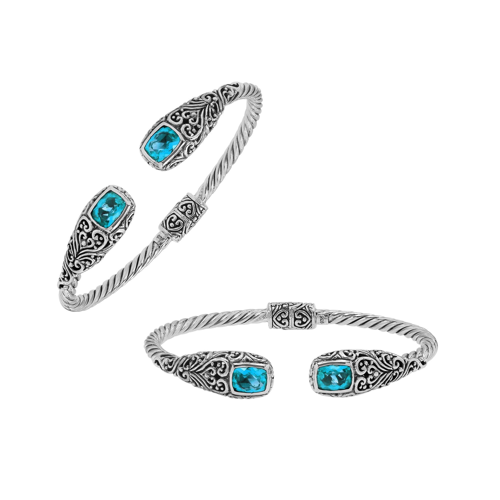 Sterling silver twisted bangle with blue topaz quartz ends and Balinese oxidized detailing