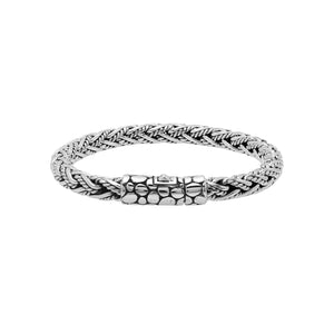 Sterling silver woven bracelet with textured Balinese clasp and oxidized polished finish