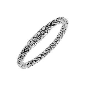 Sterling silver woven bracelet with textured Balinese clasp and oxidized polished finish