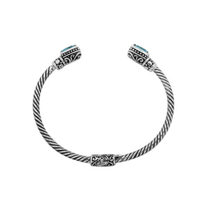 Silver twisted cable bangle in 925 sterling silver with Blue Topaz Quartz and ornate Balinese engraving.