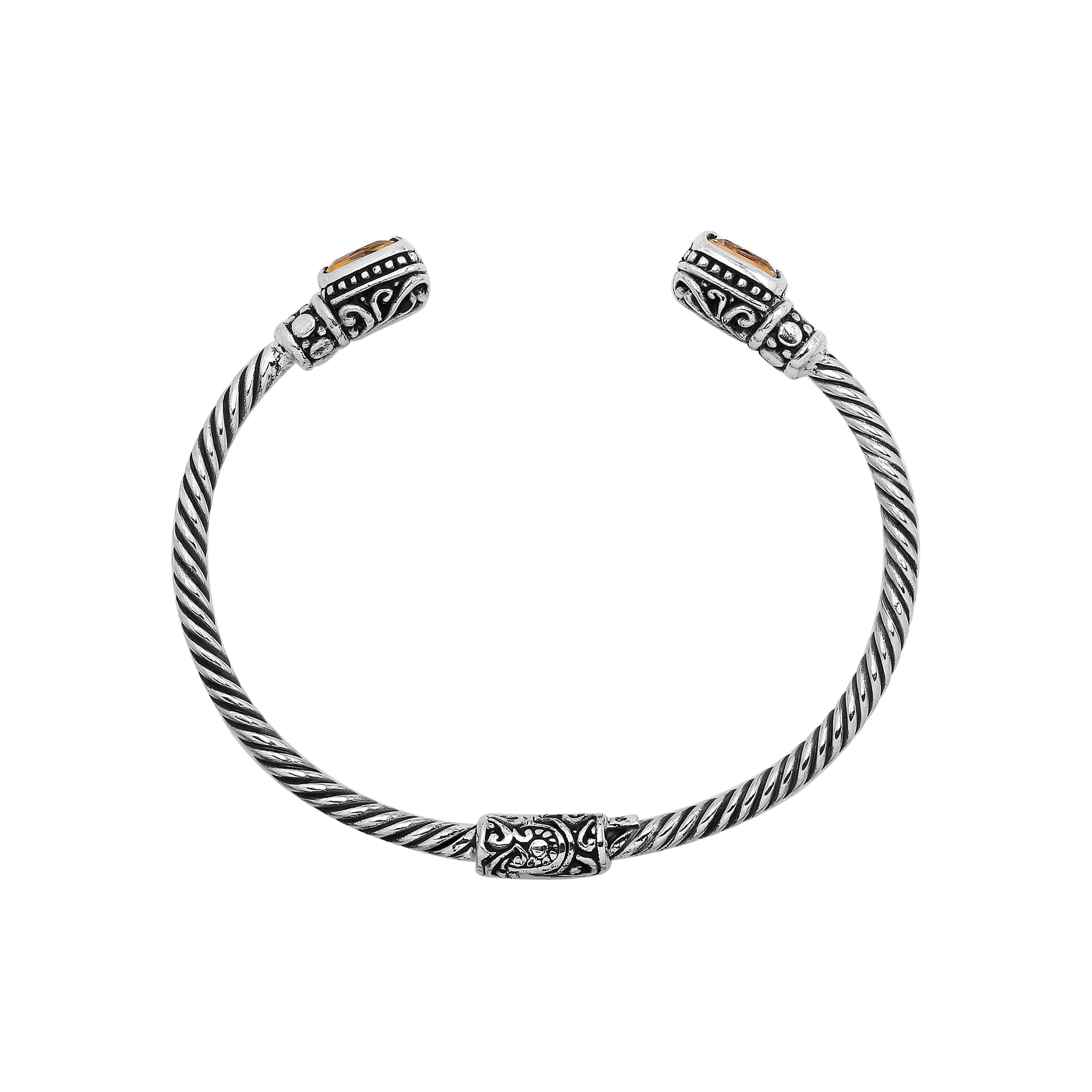 Silver twisted cable bangle in 925 sterling silver with Citrine Quartz and Balinese engraving.