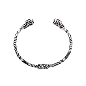 Silver twisted cable bangle in 925 sterling silver with Garnet Quartz ends and Balinese engraving.
