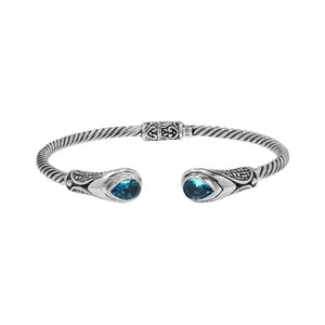 Silver twisted cable bangle in 925 sterling silver with Blue Topaz Quartz and Balinese engraving.