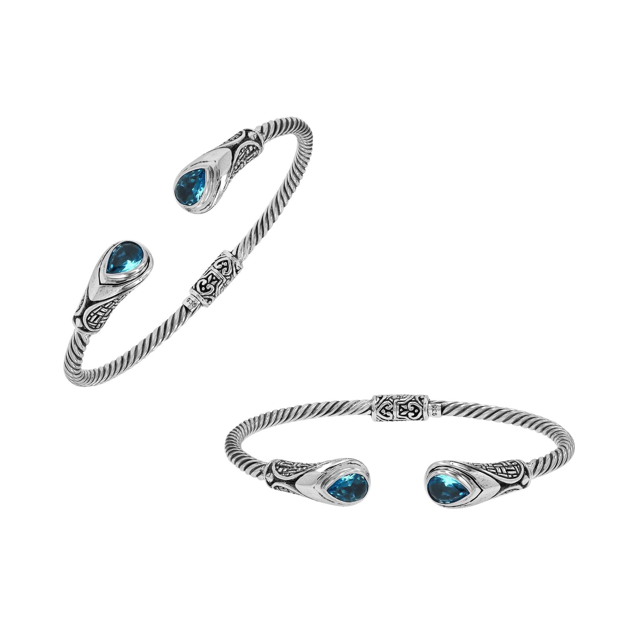 Silver twisted cable bangle in 925 sterling silver with Blue Topaz Quartz and Balinese engraving.