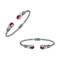Silver twisted cable bangle in 925 sterling silver with Garnet Quartz ends and Balinese engraving.
