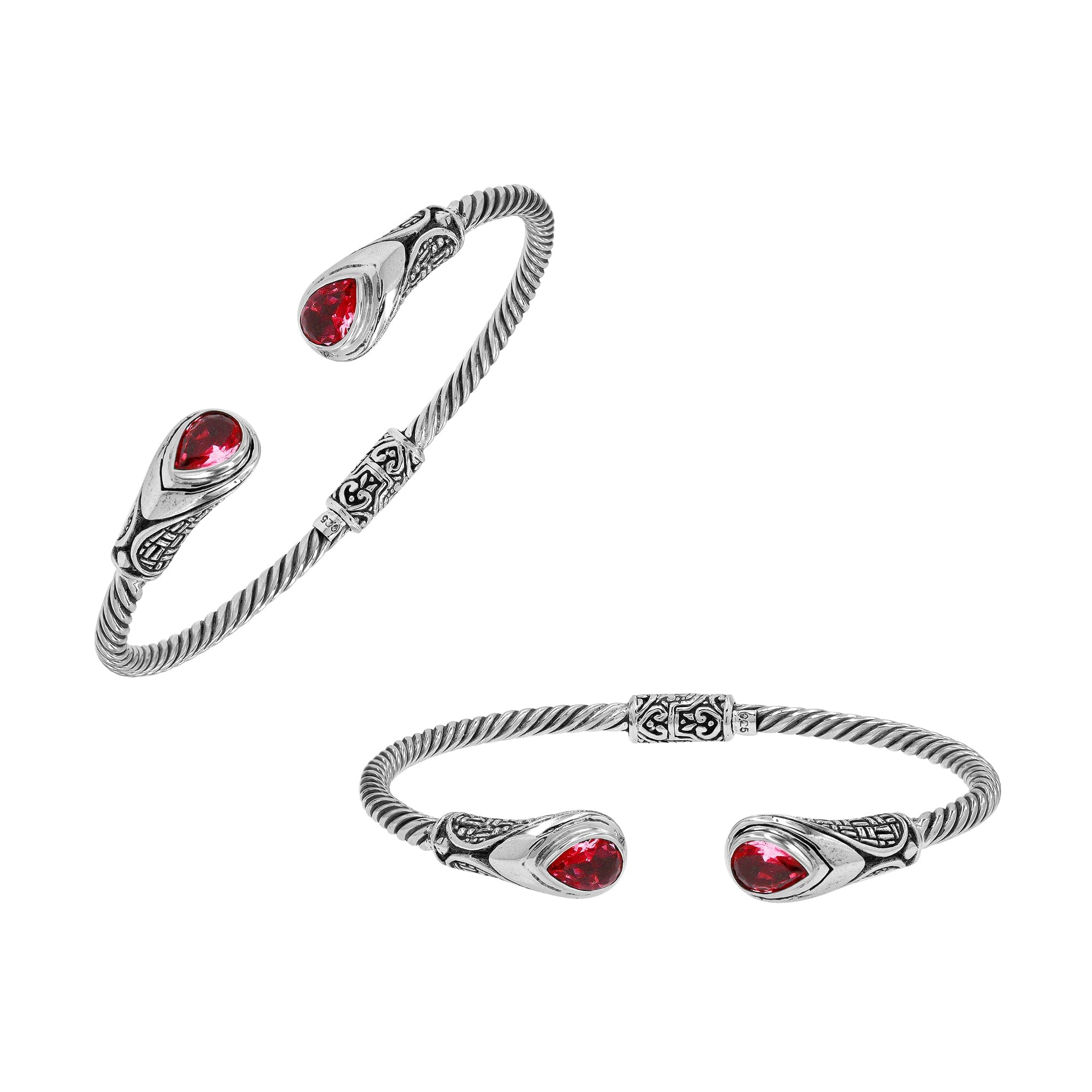 Silver twisted cable bangle in 925 sterling silver with Garnet Quartz ends and Balinese engraving.