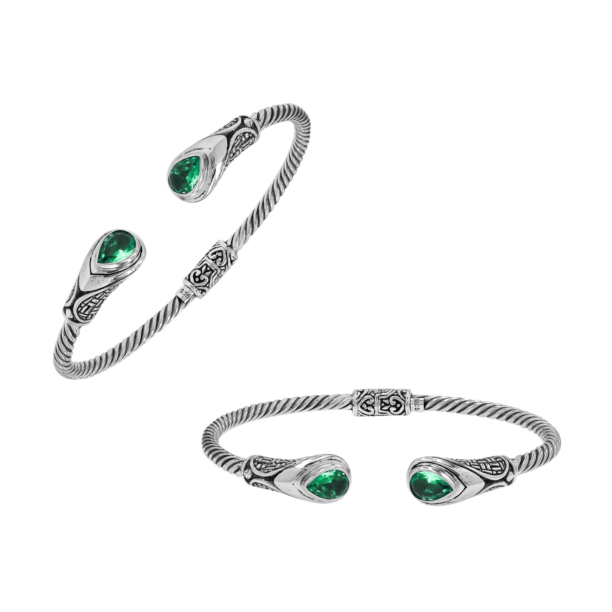 Silver twisted cable bangle in 925 sterling silver with Green Quartz ends and Balinese engraving.