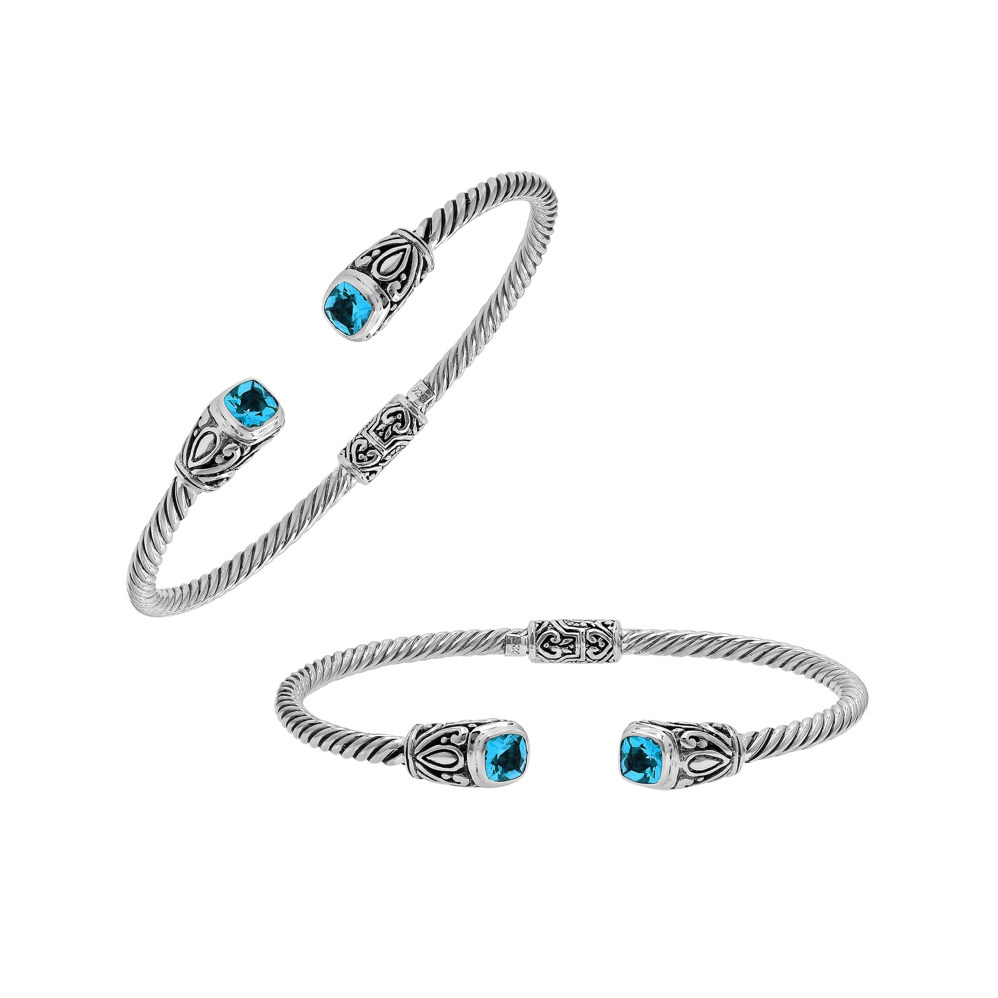 Silver twisted cable bangle in 925 sterling silver with Blue Topaz Quartz ends and Balinese engraving.