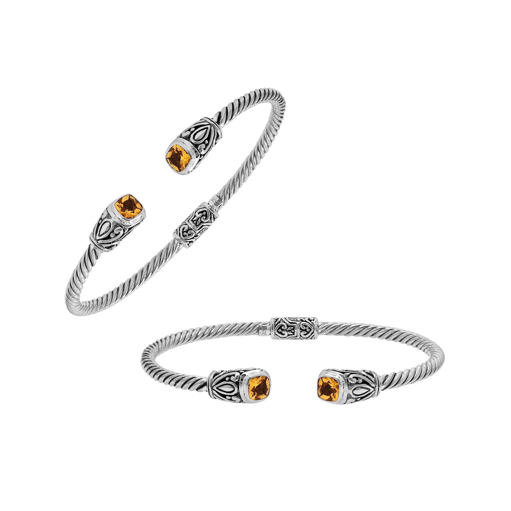 Silver twisted cable bangle in 925 sterling silver with Citrine Quartz ends and Balinese engraving.