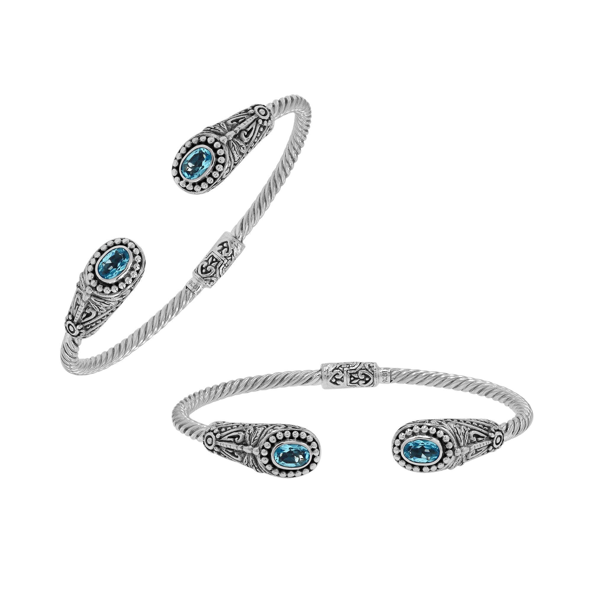 Silver twisted cable bangle in 925 sterling silver with Blue Topaz Quartz ends and Balinese engraving.