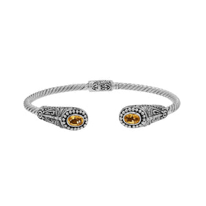 Silver twisted cable bangle in 925 sterling silver with Citrine Quartz ends and Balinese engraving.