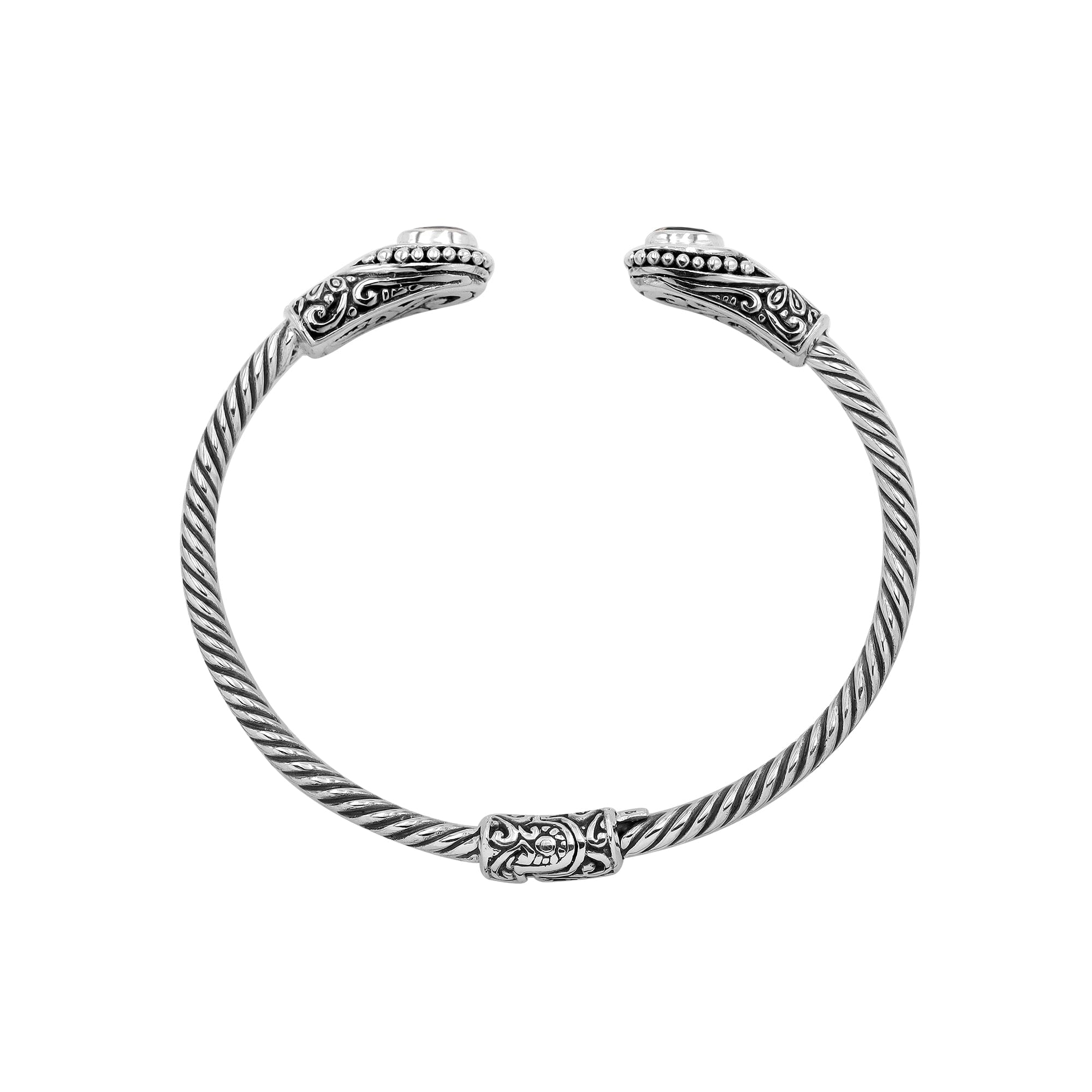 925 sterling silver cable bangle with Blue Topaz Quartz stones and hand-engraved Balinese detailing.