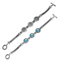 Handcrafted sterling silver bracelet with faceted Blue Topaz Quartz, circular artisan motifs, braided chain detailing, and a toggle lock.