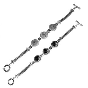 Sterling silver bracelet with Black Onyx, detailed circular motifs, multi-strand braided chains, and a decorative toggle clasp.