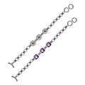 Wholesale sterling silver bracelet featuring three cushion Amethyst Quartz stones set in ornate Balinese frames with textured chain links and a secure toggle lock design.