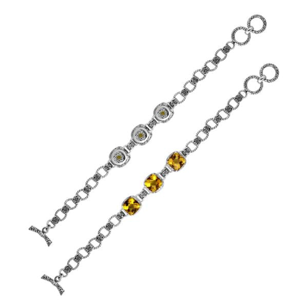 Wholesale sterling silver bracelet featuring three cushion-cut Citrine Quartz stones set in ornate Balinese frames with textured silver chain links and a sturdy toggle lock.