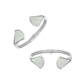 Wholesale sterling silver cuff featuring smooth Mother Of Pearl inlays placed on sculpted open ends with a polished finish and secure hinge lock for catalog display.