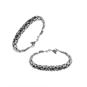 Wholesale sterling silver bracelet featuring a bold 7MM x 9MM braided chain with polished and oxidized details and a secure toggle lock for catalog-ready presentation.