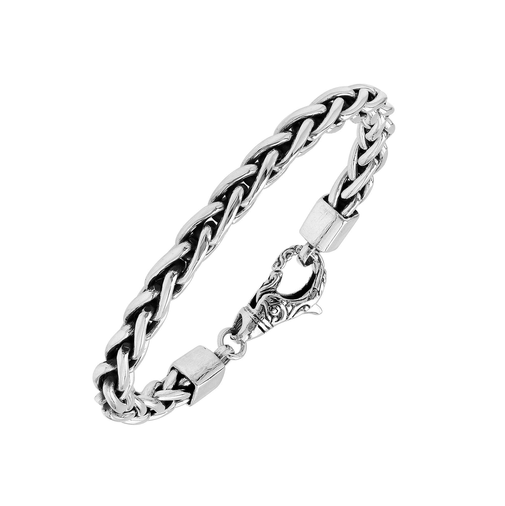 Wholesale sterling silver bracelet featuring a braided chain and decorative lobster clasp handcrafted in Bali.