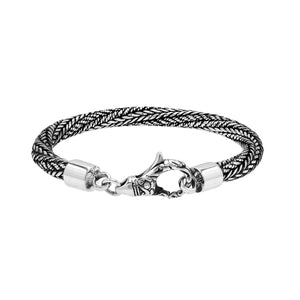 Wholesale sterling silver bracelet featuring a 5MM handwoven Balinese chain design with oxidized detailing and a decorative lobster lock for secure fastening and durability.