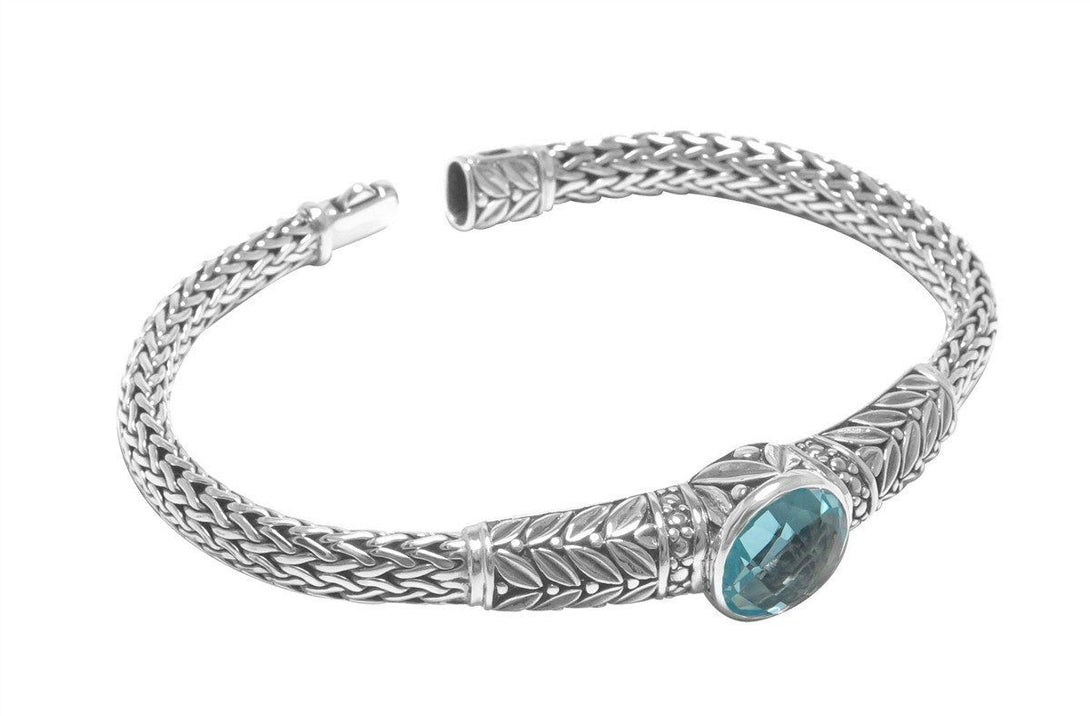 AB-8003-BT Sterling Silver Bangle With Blue Topaz Q. Jewelry Bali Designs Inc 