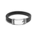 Wholesale sterling silver men’s bracelet featuring a smooth center plate, braided leather band, and secure push clasp crafted with detailed Bali-inspired accents.