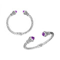 Wholesale sterling silver twisted cable cuff bracelet featuring faceted amethyst quartz end caps, 4MM band size, hinge lock, and detailed Bali-style engravings.