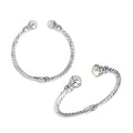 Wholesale sterling silver twisted cable cuff bracelet featuring smooth Mabe pearl end caps, hinge lock, and artisan detailing for premium jewelry assortments.