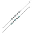 Wholesale sterling silver bracelet with blue topaz quartz stones and alternating Bali filigree links.