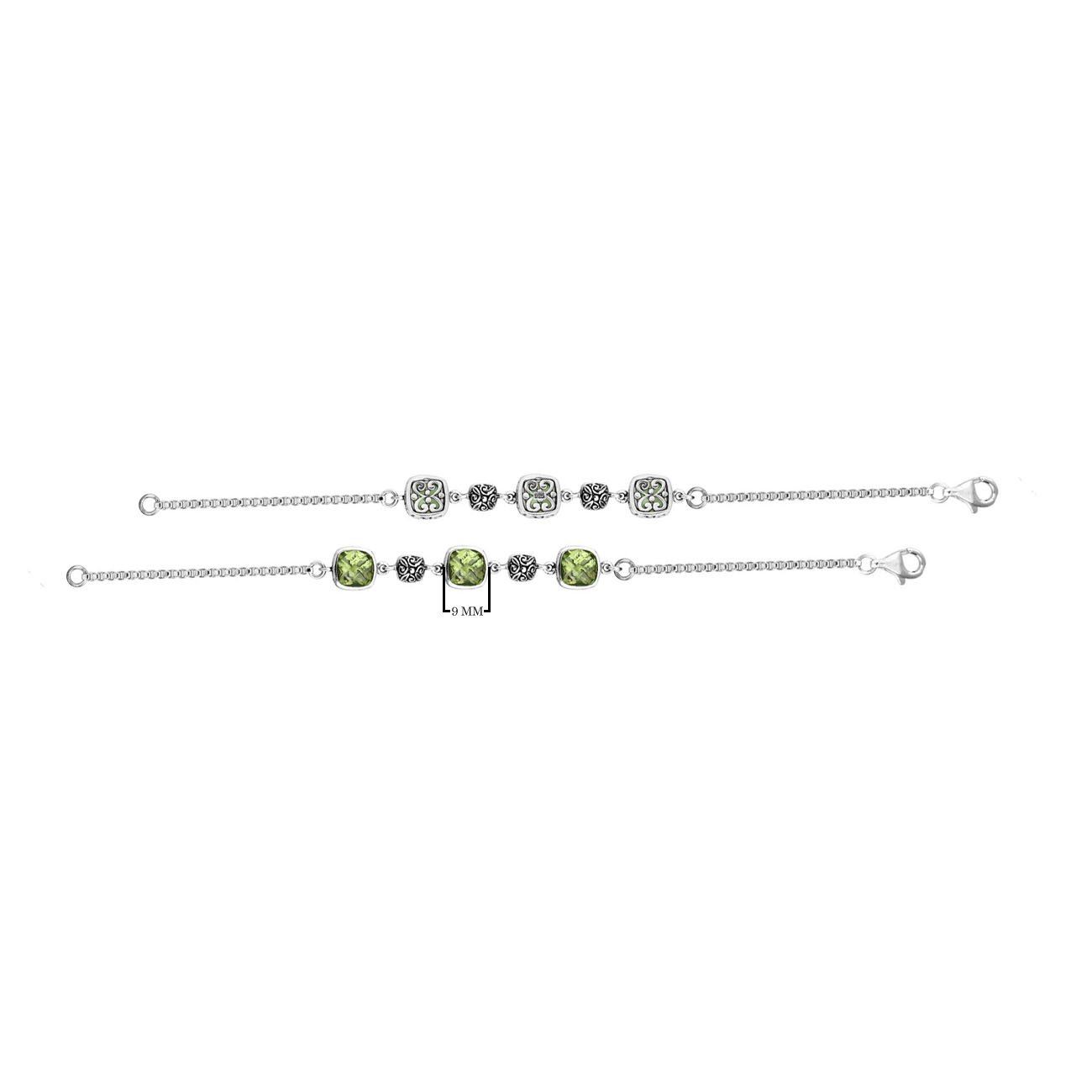 Wholesale sterling silver bracelet featuring green amethyst quartz stones, intricate Bali filigree links, and a polished–oxidized finish suitable for premium bulk jewelry collections.