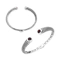 Wholesale sterling silver Bali engraved hinge cuff bracelet featuring deep red garnet quartz accents with polished–oxidized detailing, ideal for premium bulk jewelry inventory selections.
