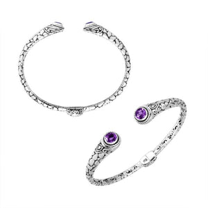 Wholesale sterling silver Bali engraved hinge cuff bracelet featuring polished–oxidized detailing and brilliant amethyst quartz ends, crafted to enhance premium wholesale jewelry collections with artistic detail.