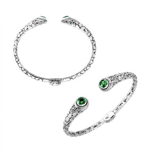 Wholesale sterling silver Bali engraved hinge cuff bracelet featuring radiant green quartz ends with polished–oxidized detailing, designed to enhance premium, modern, and artisan-focused wholesale jewelry lines.