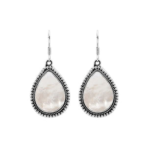 Wholesale sterling silver teardrop Mother of Pearl earrings with Bali-inspired beaded border, handcrafted artisan jewelry for bulk orders.