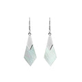Wholesale sterling silver Mother of Pearl drop earrings with geometric cut design, luminous iridescent finish, and artisan silver detailing for bulk buyers and retailers.