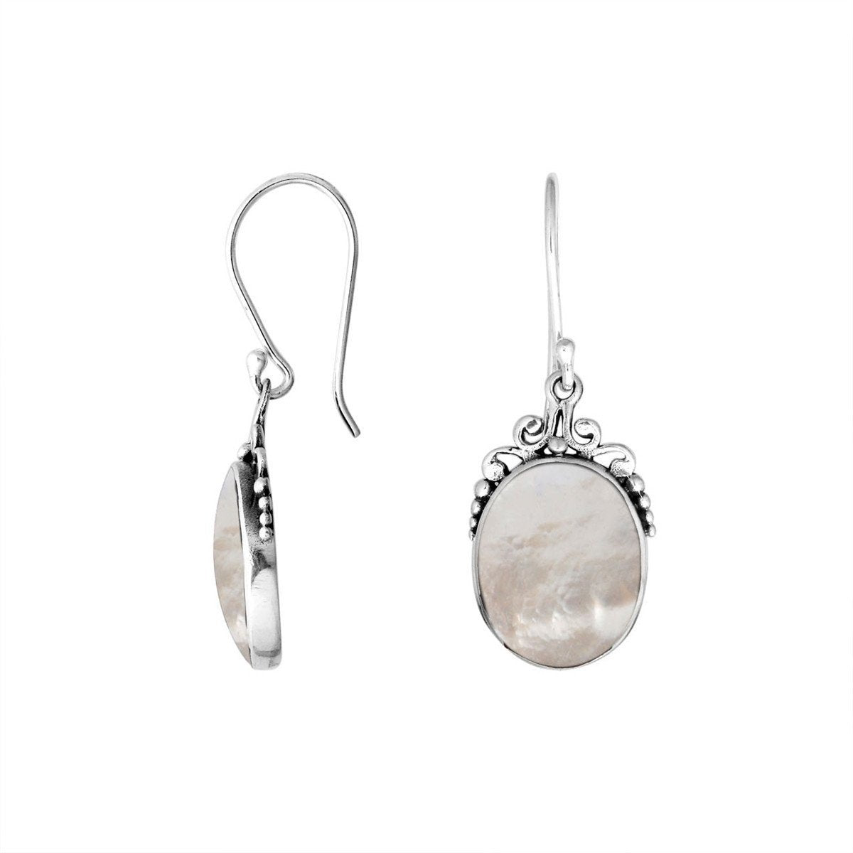 Sterling silver mother of pearl oval earrings with scroll and bead accent design for wholesale jewelry buyers