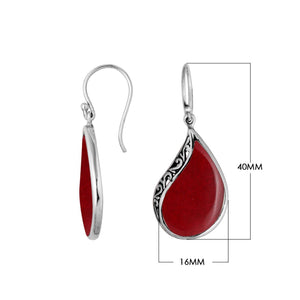 Wholesale sterling silver teardrop earrings with bold red coral inlay and Balinese scroll detailing, handcrafted in Bali