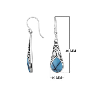 Sterling silver long teardrop earrings with Turquoise Shell and Balinese scrollwork.