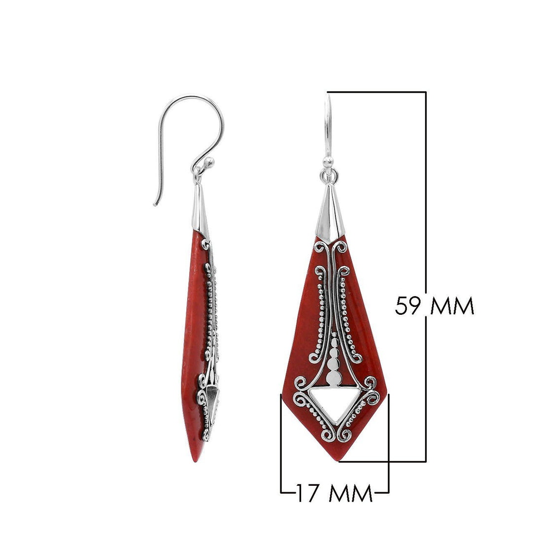 Silver elongated earrings with Red Coral and ornate scroll detailing