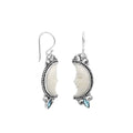 Sterling silver lunar bone face earrings with blue topaz quartz accent and earwire lock