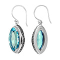 Wholesale sterling silver marquise-shaped Blue Topaz Quartz earrings with polished finish and earwire lock.
