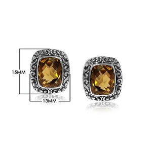 Wholesale sterling silver Citrine Quartz cushion stud earrings with polished finish and push-back lock.