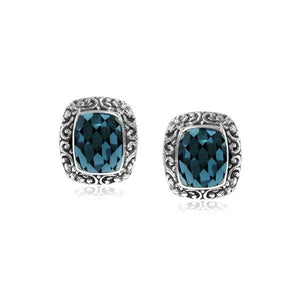 Wholesale sterling silver London Blue Topaz Quartz cushion stud earrings with polished finish and push-back lock.