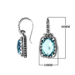 Wholesale sterling silver earrings with rectangular Blue Topaz Quartz and handcrafted metal details.