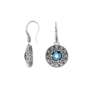 Wholesale sterling silver round earrings with Blue Topaz Quartz and patterned frame.