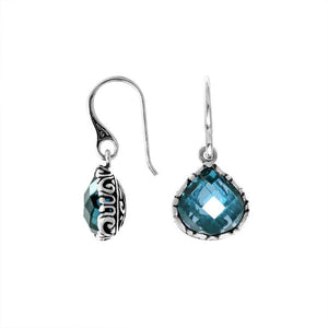 Wholesale sterling silver teardrop earrings with Blue Topaz Quartz and carved side detailing.
