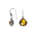 Wholesale sterling silver teardrop earrings with faceted citrine quartz center in polished frame.